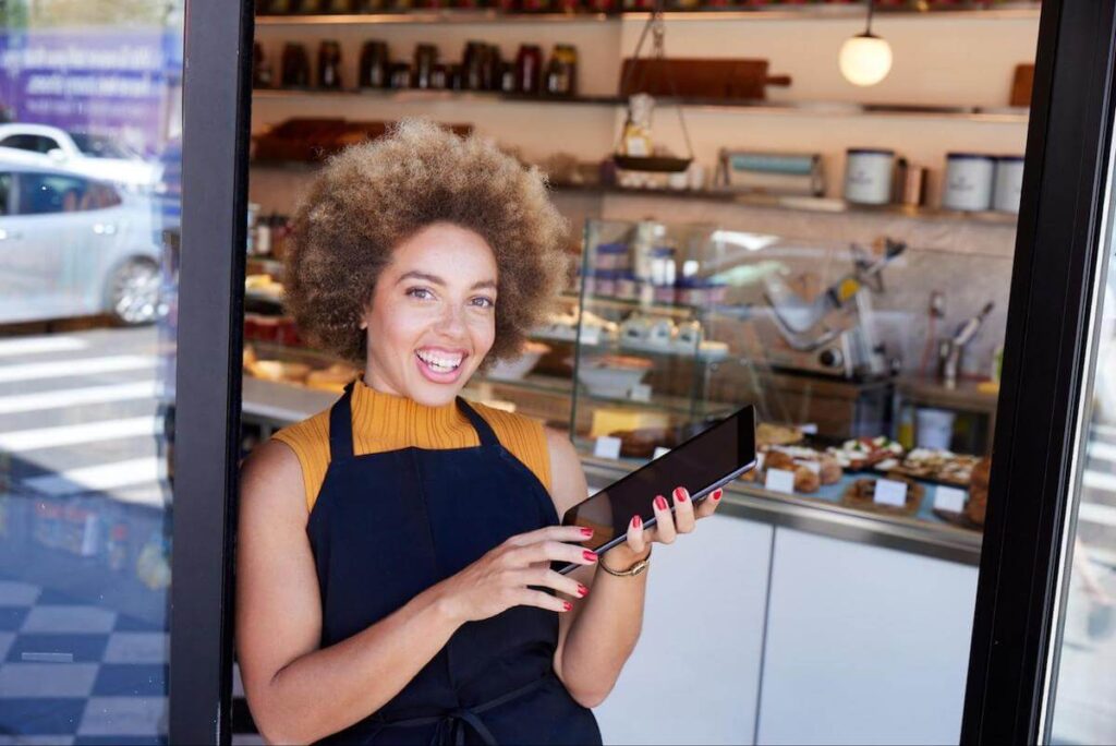 Waiter holding a tablet