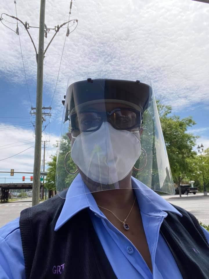 Operator wearing face mask and face shield 