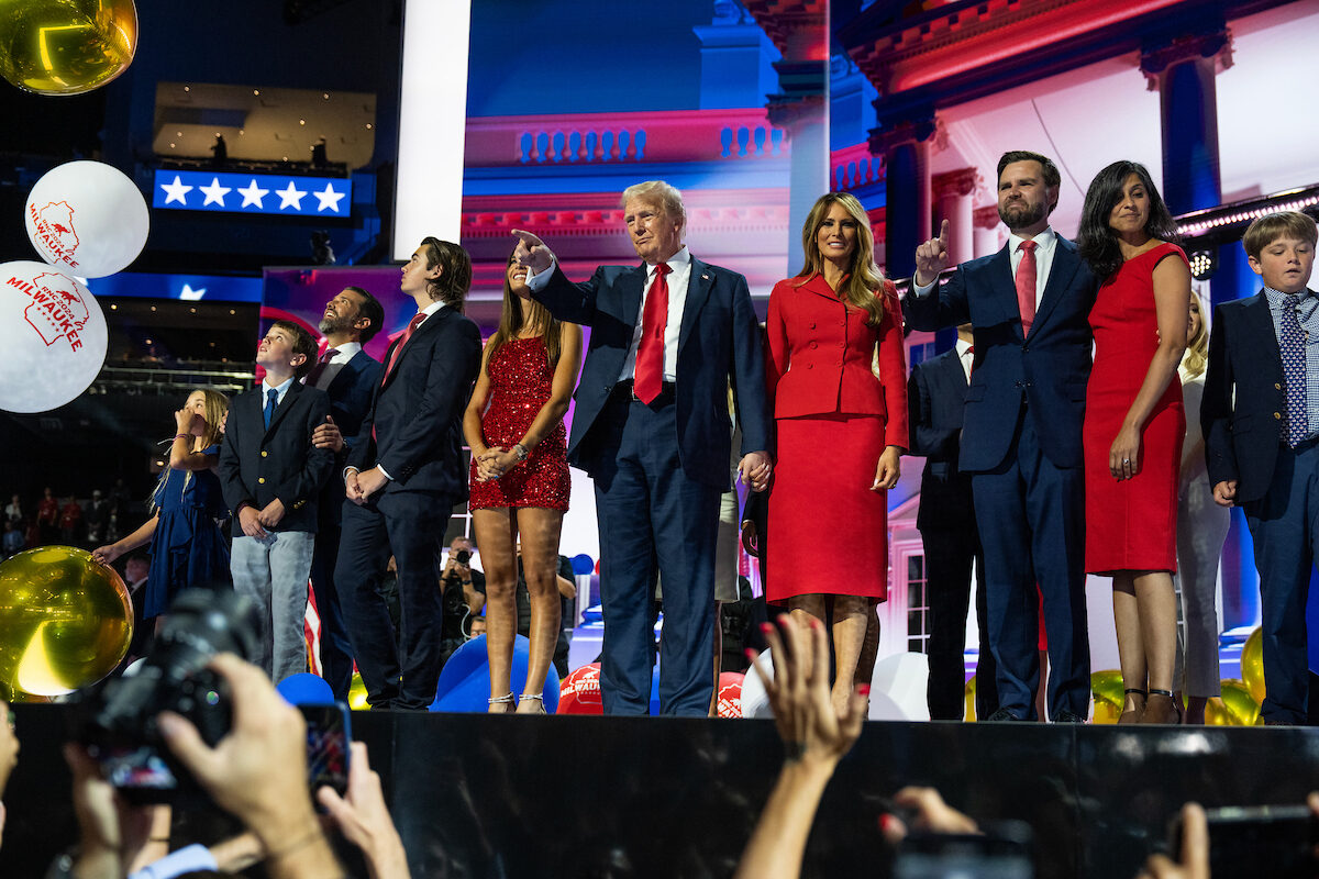 President-elect Donald Trump, Melania Trump, Vice President-elect JD Vance, R-Ohio, and his wife Usha Chilukuri Vance, celebrate during the balloon drop in Milwaukee's Fiserv Forum at the Republican National Convention on July 18. (Tom Williams/CQ Roll Call)