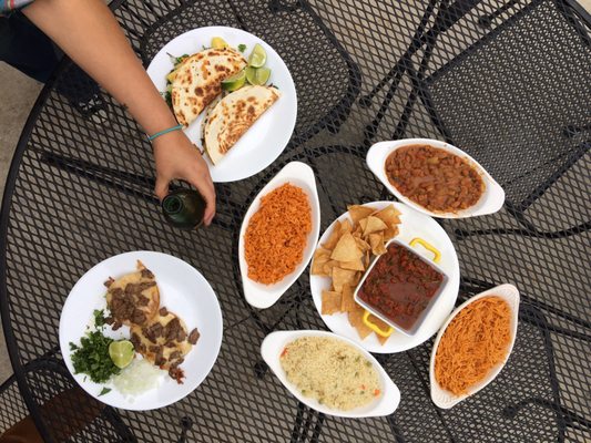 Photo of Marioli - San Antonio, TX, US. a table full of mexican food