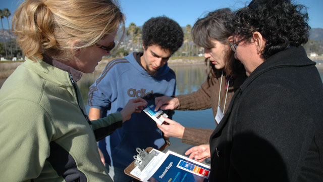 teachers and students testing water