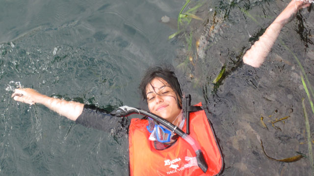 photo of girl in the ocean