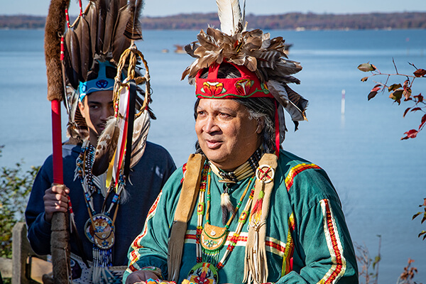 A native american in a traditional headdress