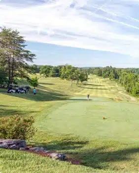 men golfing on a golf course