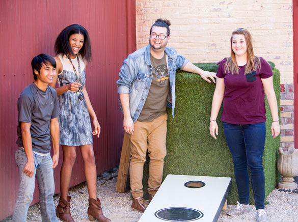 Spalding students playing cornhole