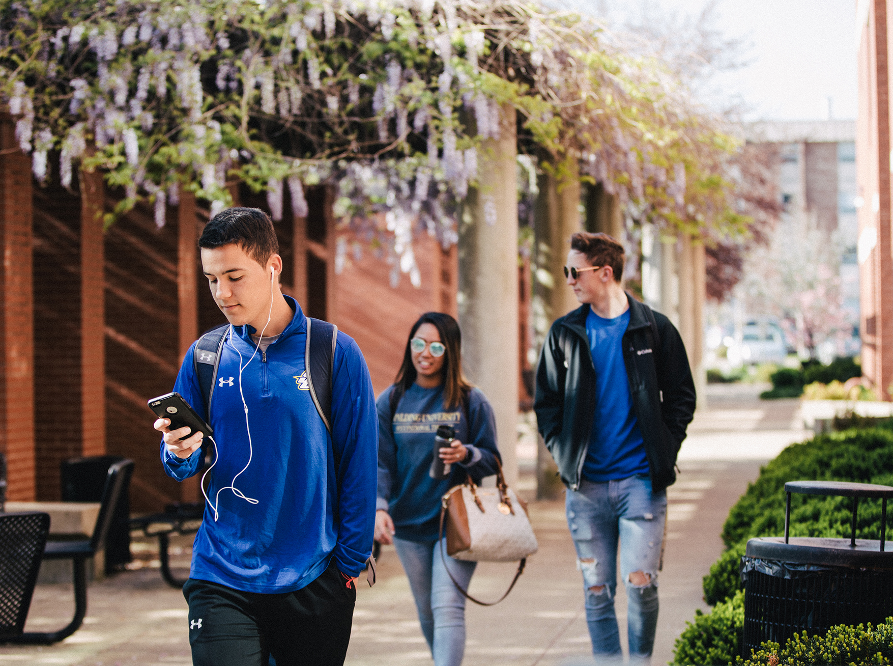 Students walking outside of the Egan Leadership Center