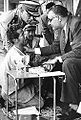 Gamal Abdel Nasser giving a homeless Egyptian man a job