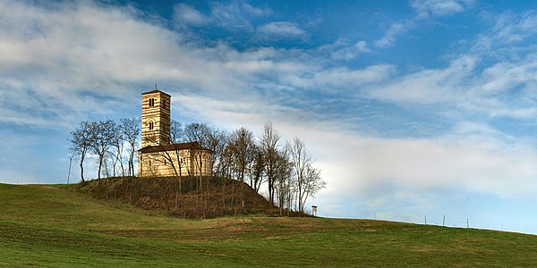 Chiesa dei Santi Nazario e Celso, Montechiaro d'Asti Photograph: Elio Pallard Licensing: CC-BY-SA-4.0 Jury: Good framing and timing (autumn). The bare trees like a transparent wall around the church.