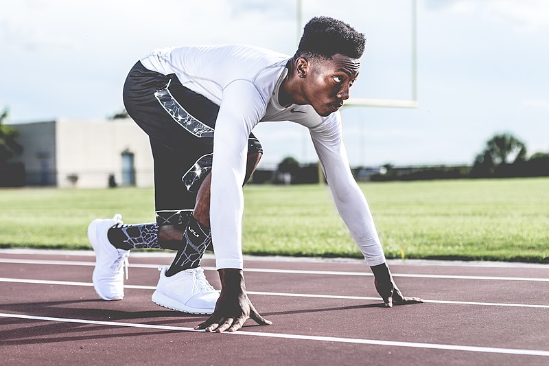 File:Man running track and field.jpg