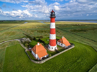 Westerheversand Lighthouse in Schleswig-Holstein, Germany Photograph: Marco Leiter Licensing: CC-BY-SA-4.0