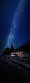 Sannaspos Railway Station as it currently appears at night.