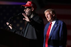 LAS VEGAS, NEVADA - SEPTEMBER 13: Recording artist Nicky Jam (L) speaks as Republican presidential nominee, former U.S. President Donald Trump, (R) looks on during a campaign rally at The Expo at World Market Center Las Vegas on September 13, 2024 in Las Vegas, Nevada. With 53 days before election day, Former President Trump continues to campaign.  (Photo by Justin Sullivan/Getty Images)