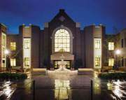 Law Center South Entrance, night view of courtyard and fountain.