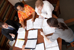 Professor Cheryl Wattley guides students in a client meeting with the OU Legal Clinic