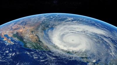 Hurricane approaching the American continent visible above the Earth, a view from the satellite. 