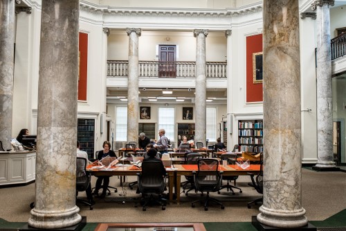 Researchers using materials in the reading room.