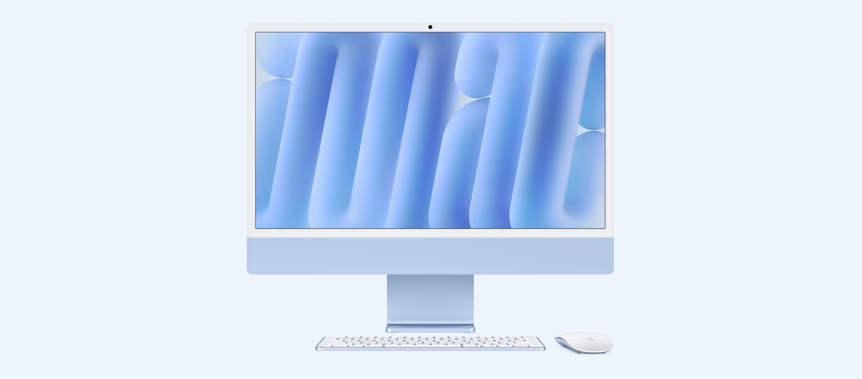 Imagem da frente de um iMac azul com mouse e keyboard na mesma cor