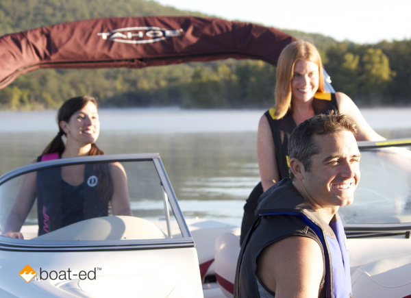 People having fun on a boat, boater safety concept. 