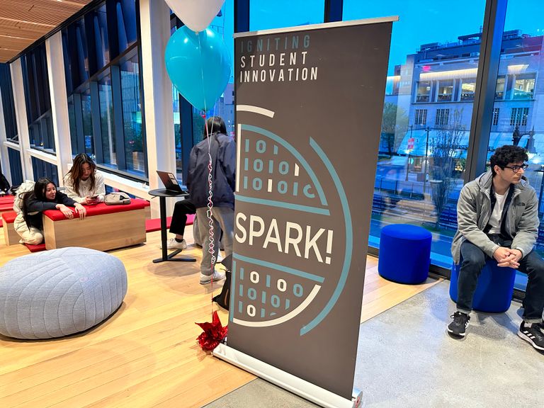 Photo of the BU Spark! standup poster on the second floor of the Boston University Center for Computing & Data Sciences