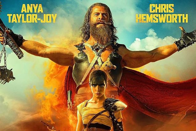 Photo: A movie poster for Furiosa: A Mad Max Saga. A bald women stands in the foreground, fierce and ready. She has a robotic claw arm on her left side. Behind her, a man with long hair and a beard stands with his arms wide open, looking powerful and intimidating.