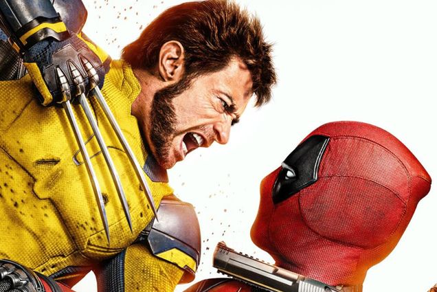 Photo: Movie poster for "Deadpool & Wolverine" featuring the two heroes in their suits. On the left is Wolverine, in a yellow suit pointing his claws at Deadpool in his read on the right, who is brandishing a gun