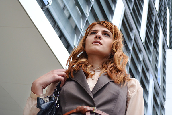 Intellectual property at BU Law. Woman standing in front of office building.