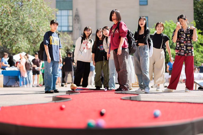 Sustainability Festival Attendees Playing Golf