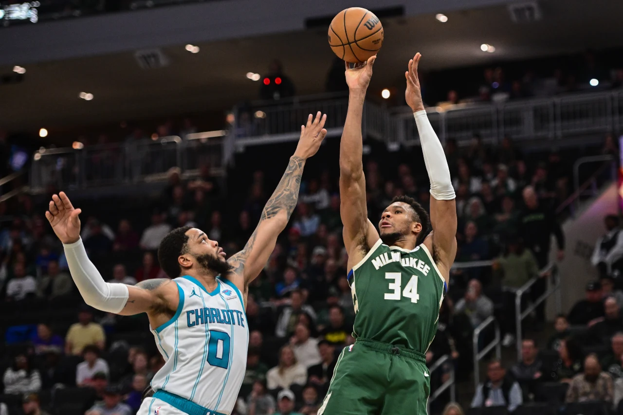 Milwaukee Bucks forward Giannis Antetokounmpo (34) takes a shot against Charlotte Hornets forward Miles Bridges (0) in the third quarter at Fiserv Forum.