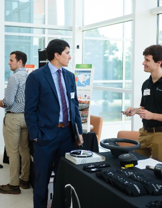 Students interacting at the College of Agriculture Forestry and Life Sciences career fair.