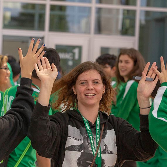 student giving a high five