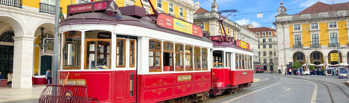 red trolley in a city