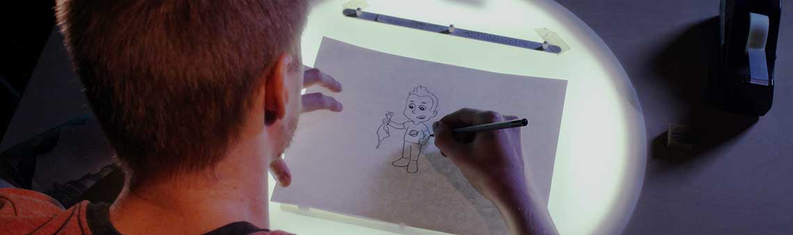 student drawing an animated sequence