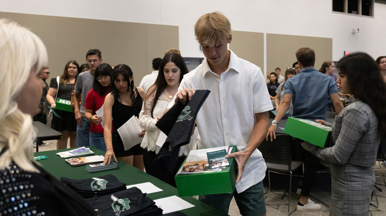 Students in line for COD apparel