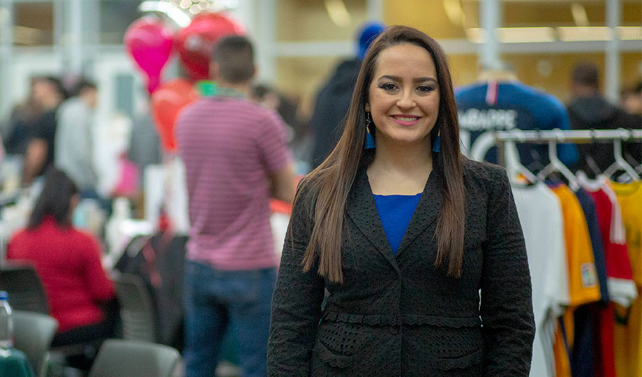 Jacqueline standing in atrium