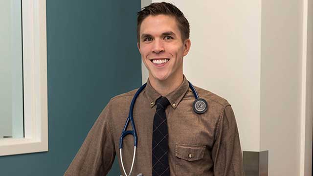 male student wearing a stethoscope 