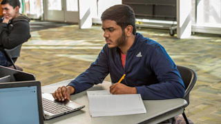 student on computer