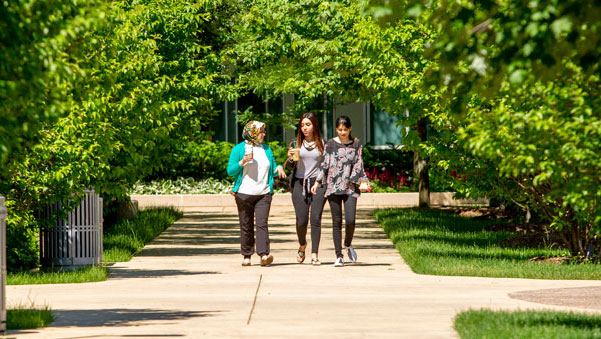 Berg Instruction Center with students walking in front of