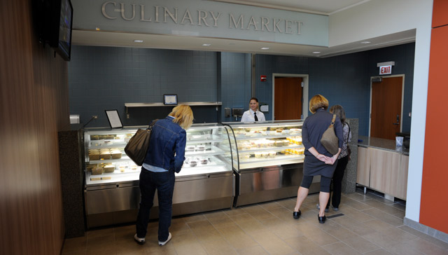 People ordering food at the Culinary Market