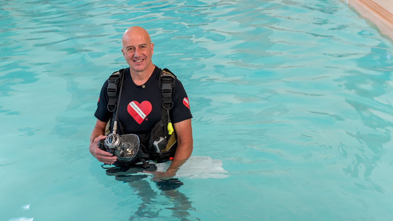 Jim Elliot in pool with scuba gear