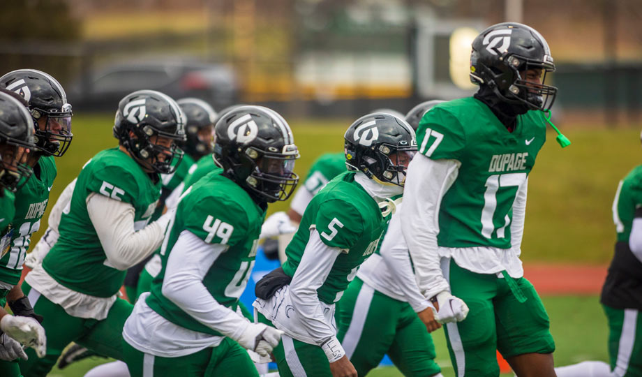 COd football players on the field during a game