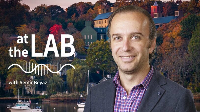 image of Cold Spring Harbor campus from across the harbor with At the Lab podcast logo and portrait of Semir Beyaz