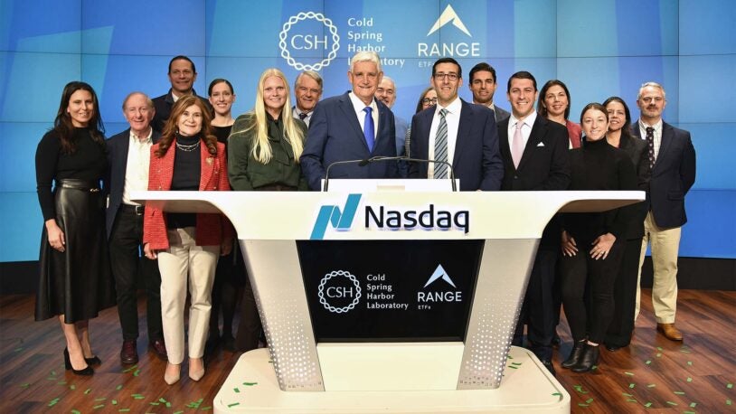 image of CSHL employees and Range ETF employees at the Nasdaq podium