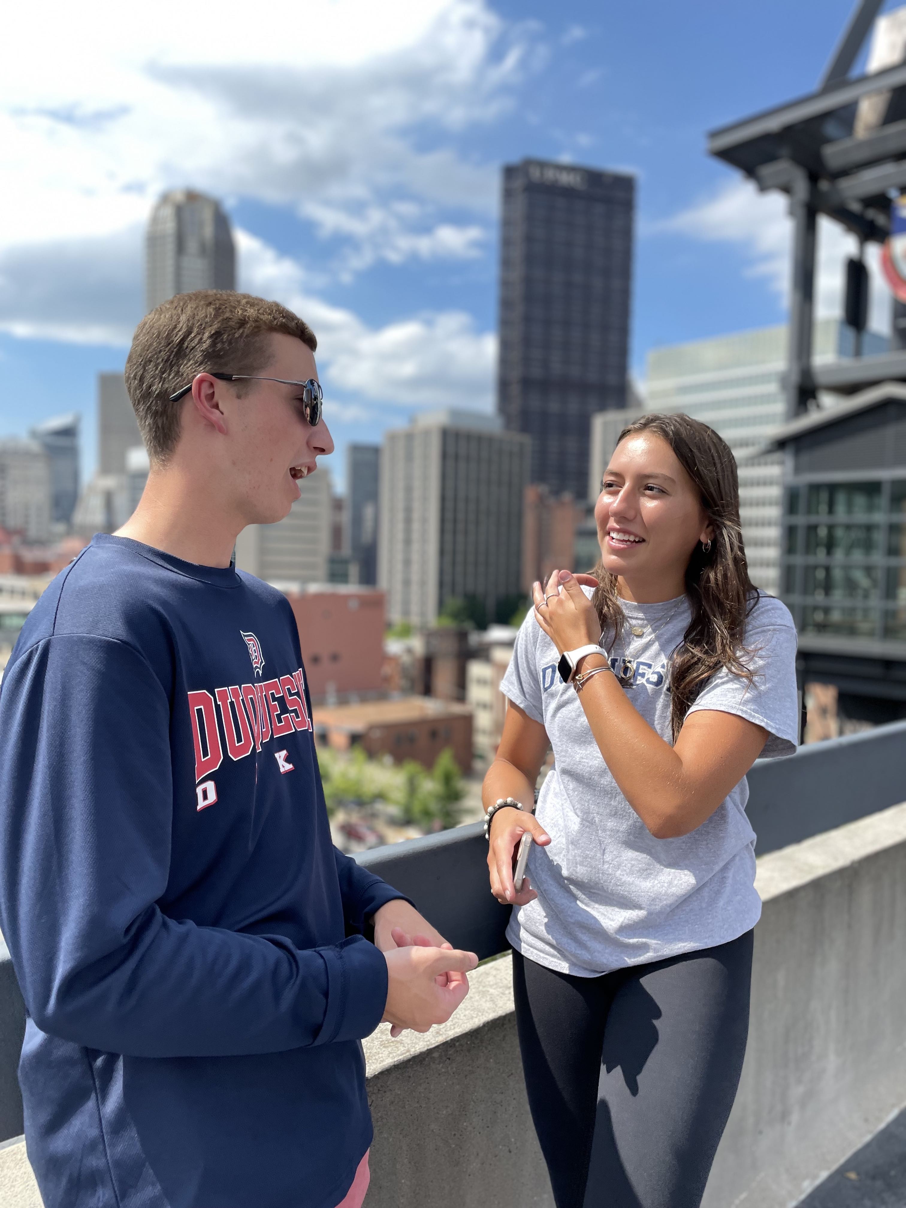 students talking on sky walk