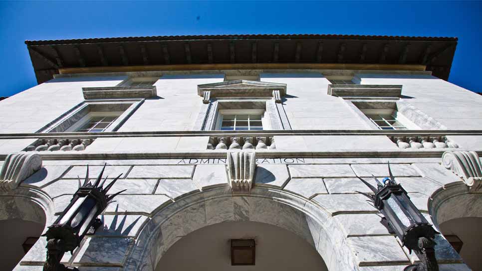 exterior shot of building entrance with blue sky