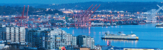 ship coming into a harbor and city skyline in background with a link to https://www.epa.gov/ports-initiative/best-clean-air-practices-port-operations.