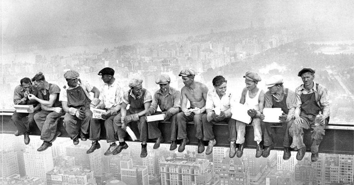 builders sitting on empire statebuilding steel