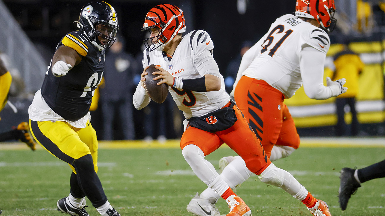 Joe Burrow #9 of the Cincinnati Bengals scrambles in the fourth quarter of a game against the Pittsburgh Steelers at Acrisure Stadium on January 04, 2025 in Pittsburgh, Pennsylvania.