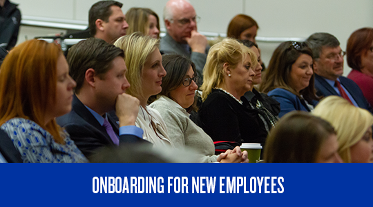 Employees watching a presentation