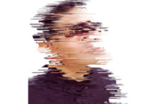 Ashok Banker. A purposefully distorted picture of what appears to be a human male staring diagonally upwards. The picture is distorted by an effect that displaces the pixels making up the image, making it impossible to see the person clearly and creating a deliberate effect of disorientation.