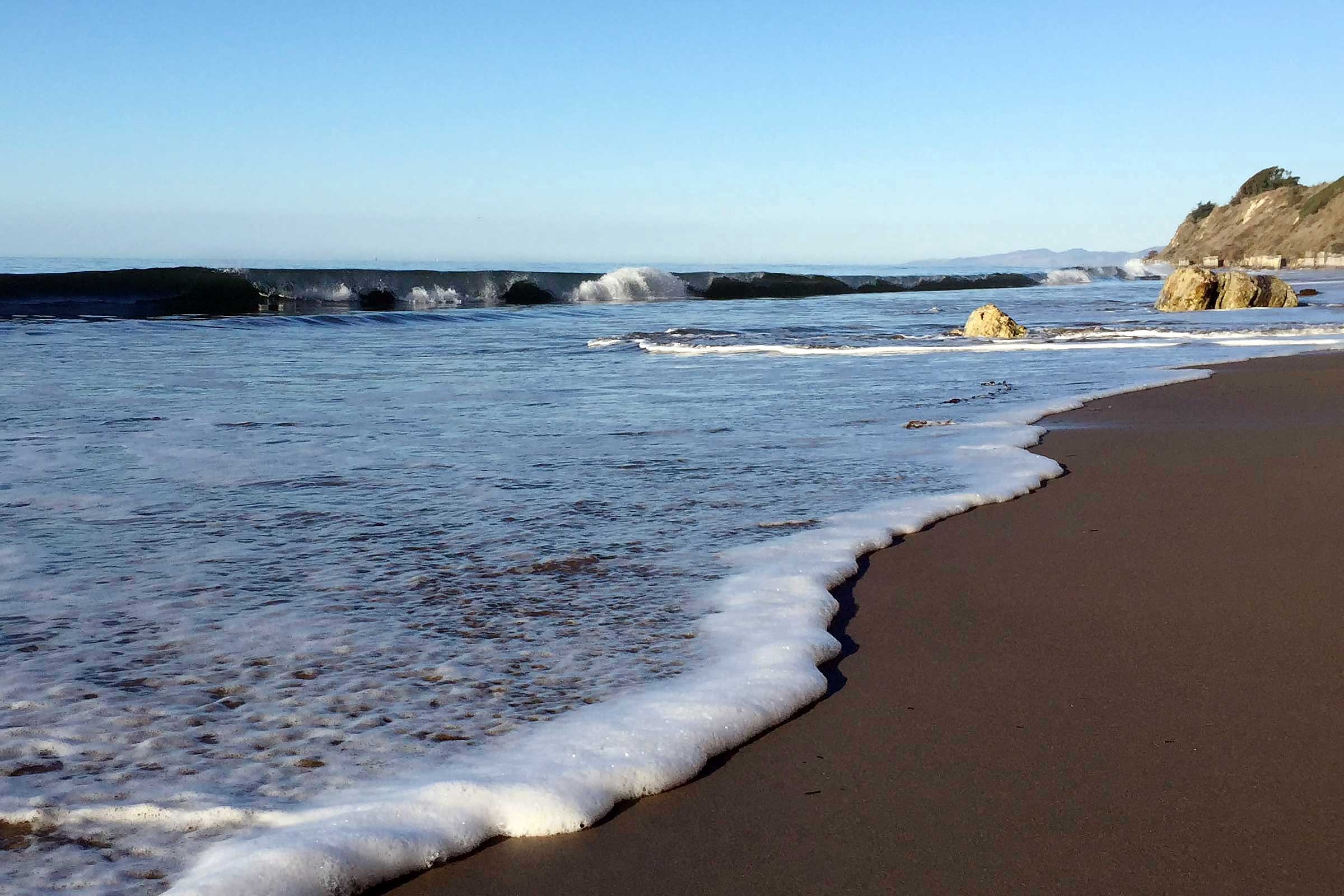 Surf at Ellwood beach. Credit: Brian Wolf